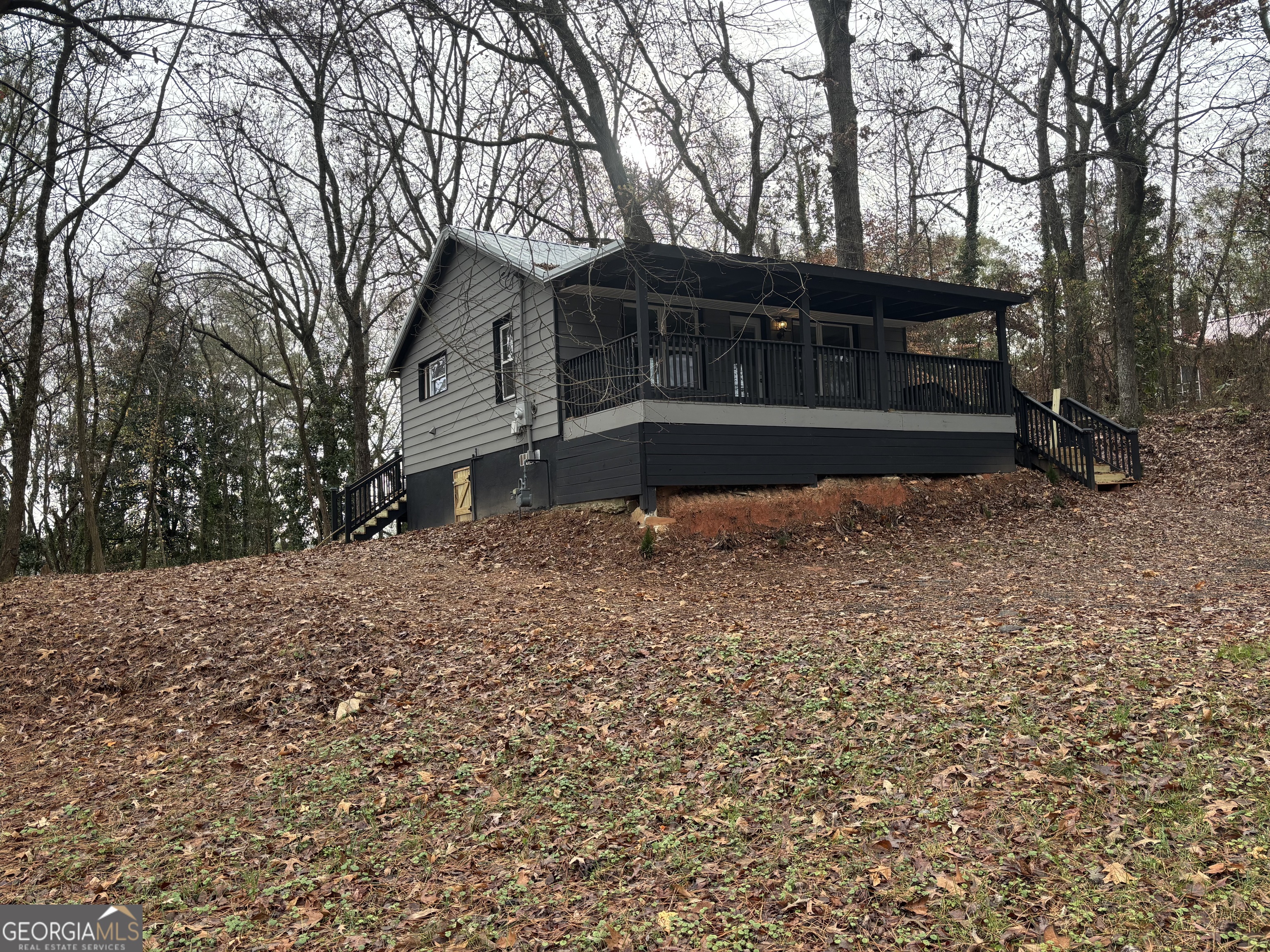 a house with trees in front of it