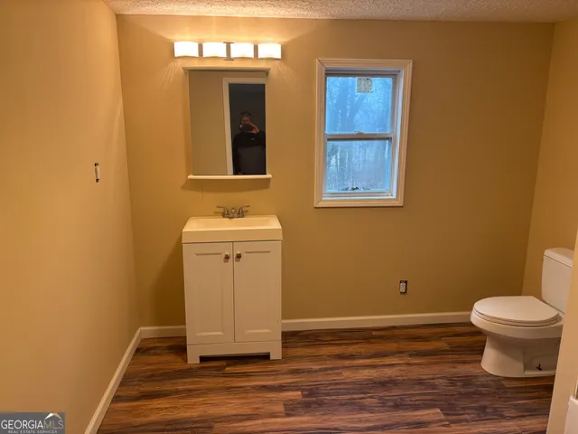 a bathroom with a sink and a toilet