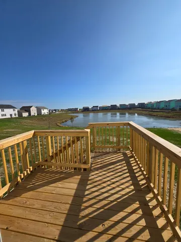 a view of wooden floor with a lake