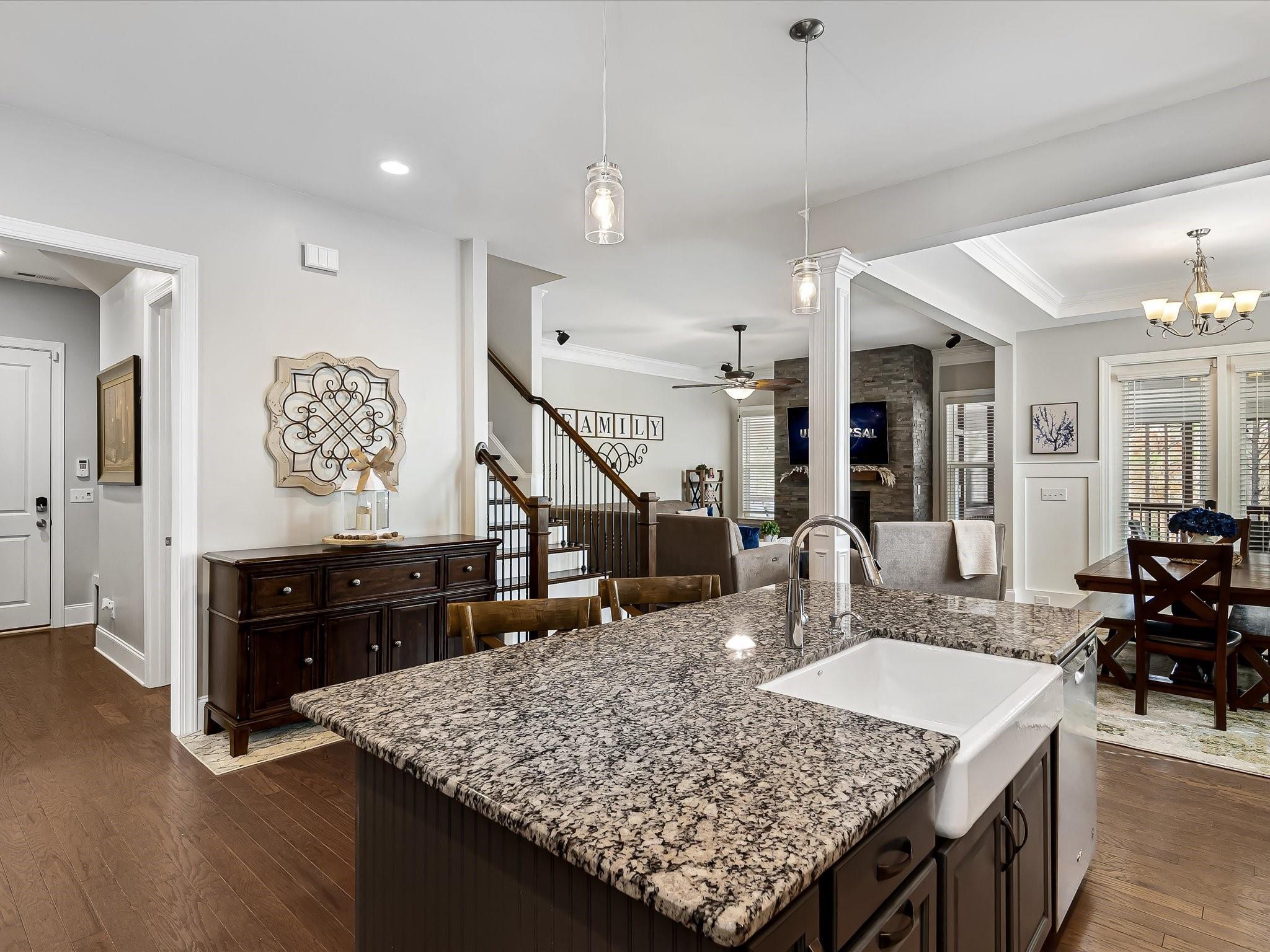 4876 Killian Crossing Drive Denver, NC 28037 - Photo 13 of 46 a living room with dining table and wooden floor