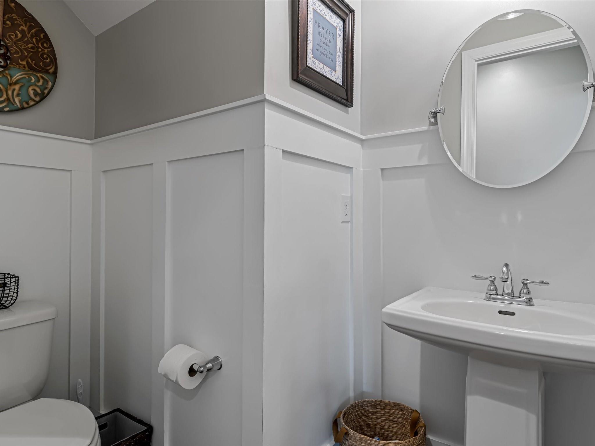 4876 Killian Crossing Drive Denver, NC 28037 - Photo 14 of 46 a bathroom with a sink mirror and toilet