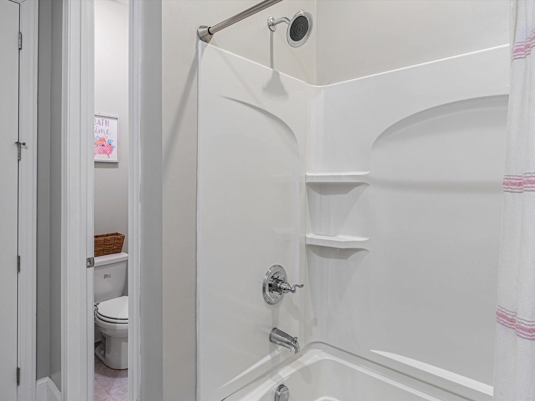 4876 Killian Crossing Drive Denver, NC 28037 - Photo 18 of 46 a bathroom with a shower and a toilet