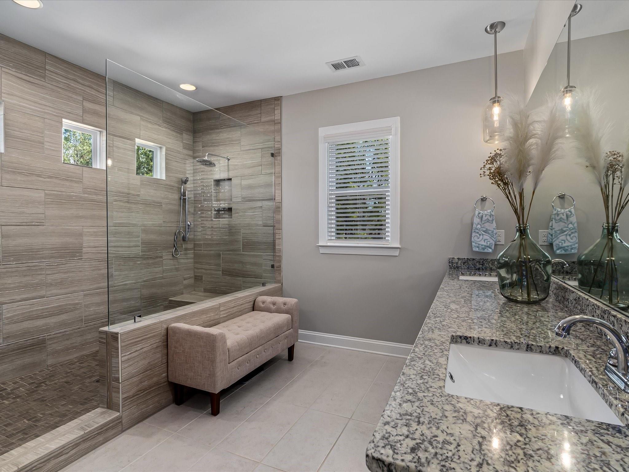4876 Killian Crossing Drive Denver, NC 28037 - Photo 23 of 46 a bathroom with a granite countertop tub sink and mirror