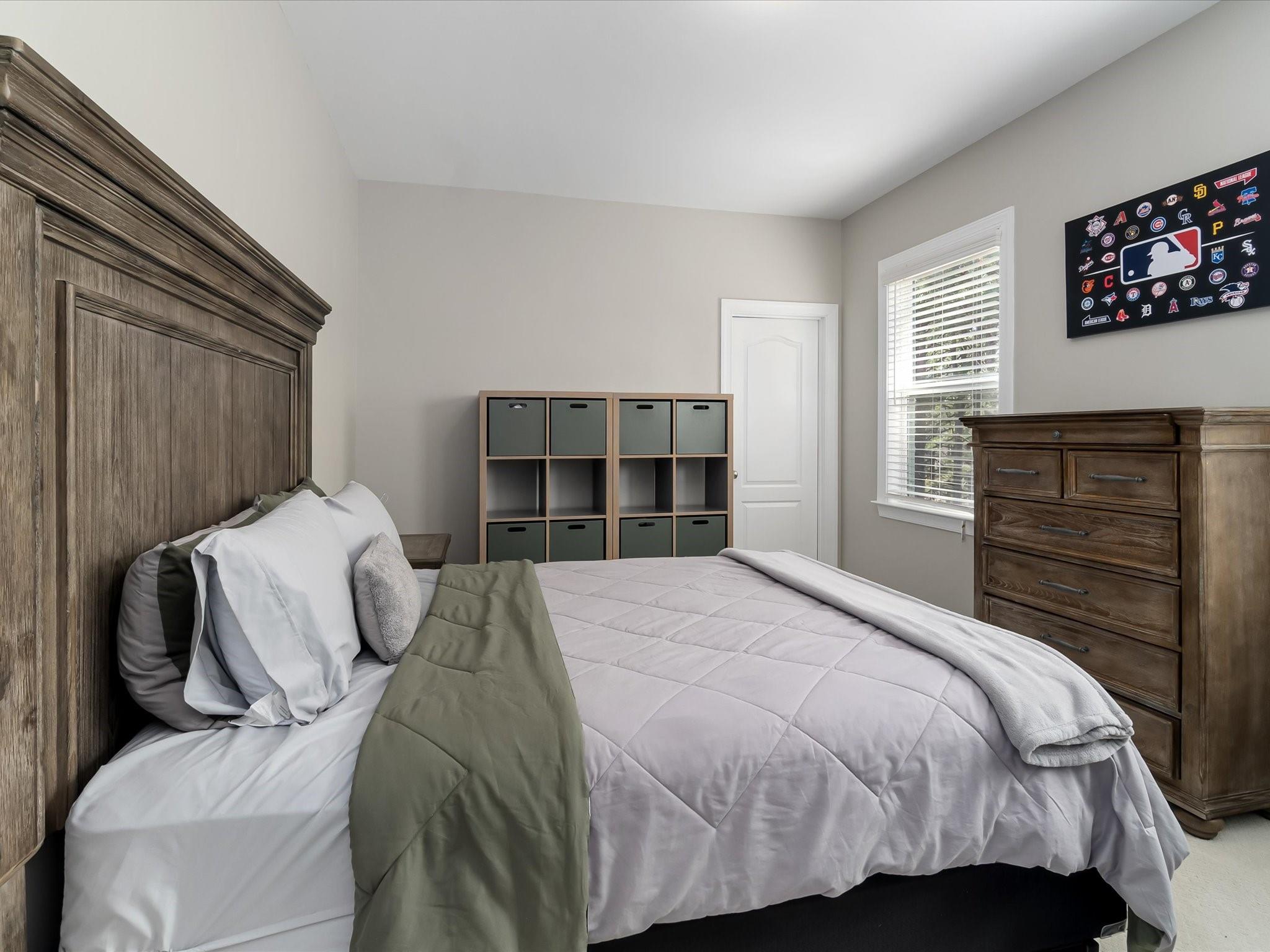 4876 Killian Crossing Drive Denver, NC 28037 - Photo 28 of 46 a bedroom with a bed and a window