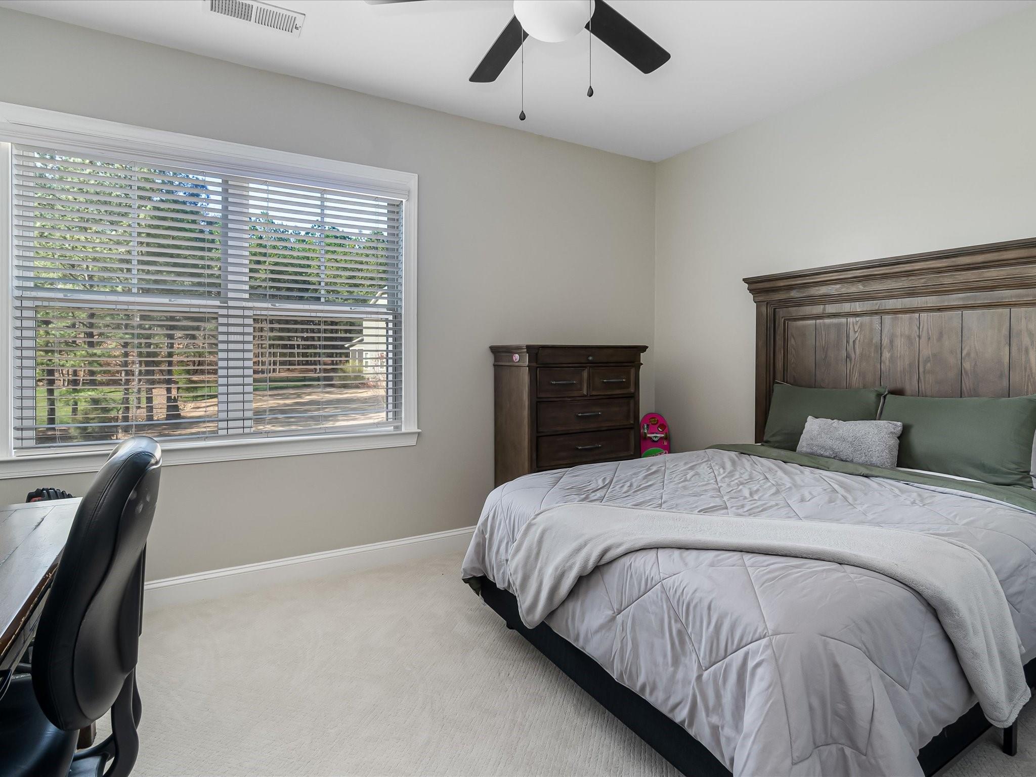 4876 Killian Crossing Drive Denver, NC 28037 - Photo 29 of 46 a bedroom with a bed and wooden floor