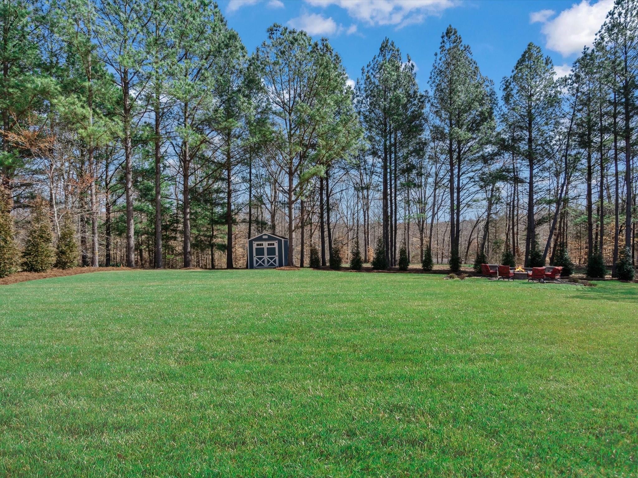 4876 Killian Crossing Drive Denver, NC 28037 - Photo 36 of 46 a view of a yard with large trees
