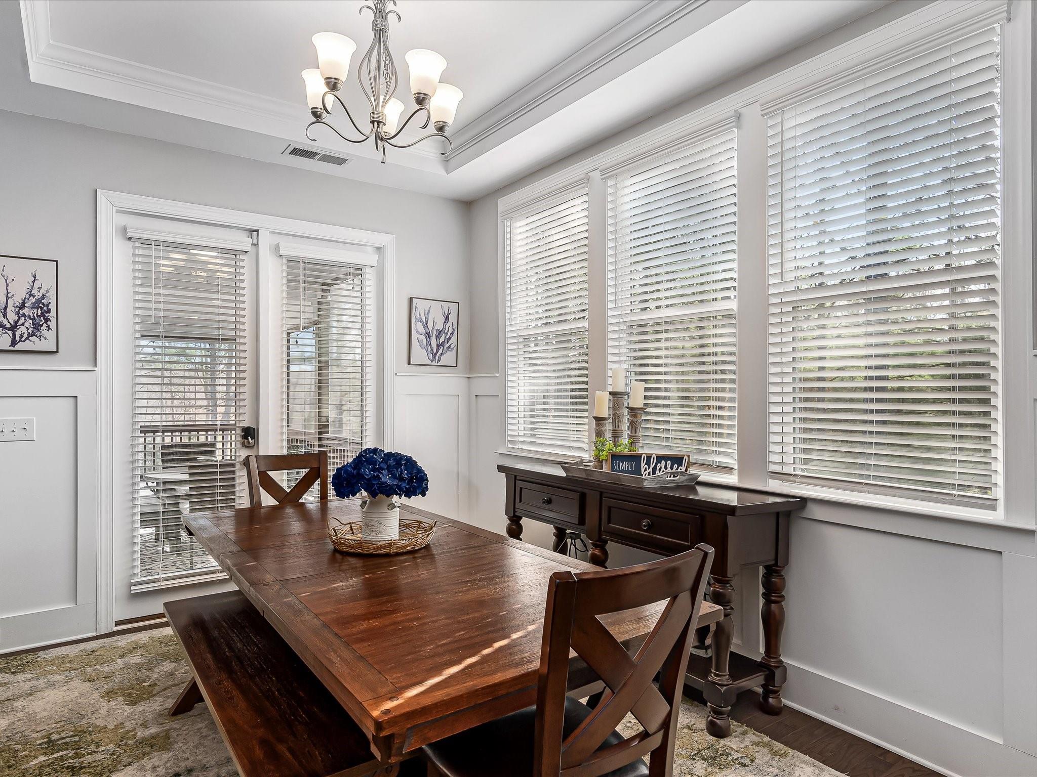 4876 Killian Crossing Drive Denver, NC 28037 - Photo 9 of 46 a dining room with furniture and window