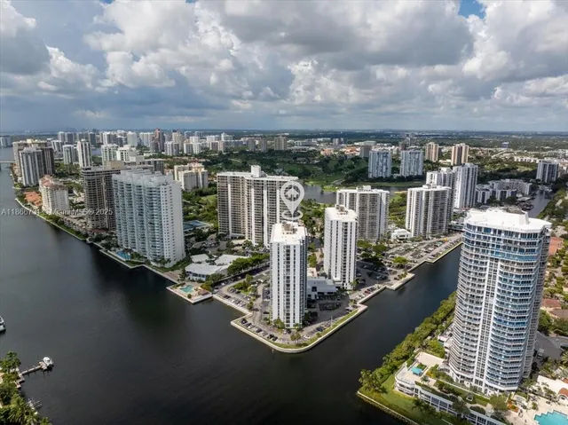 a view of roof deck with two chairs and wooden floor