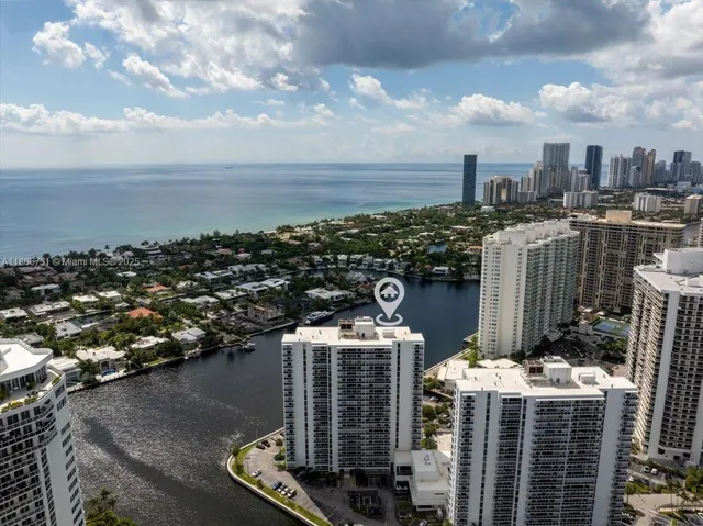 a view of a city with tall buildings
