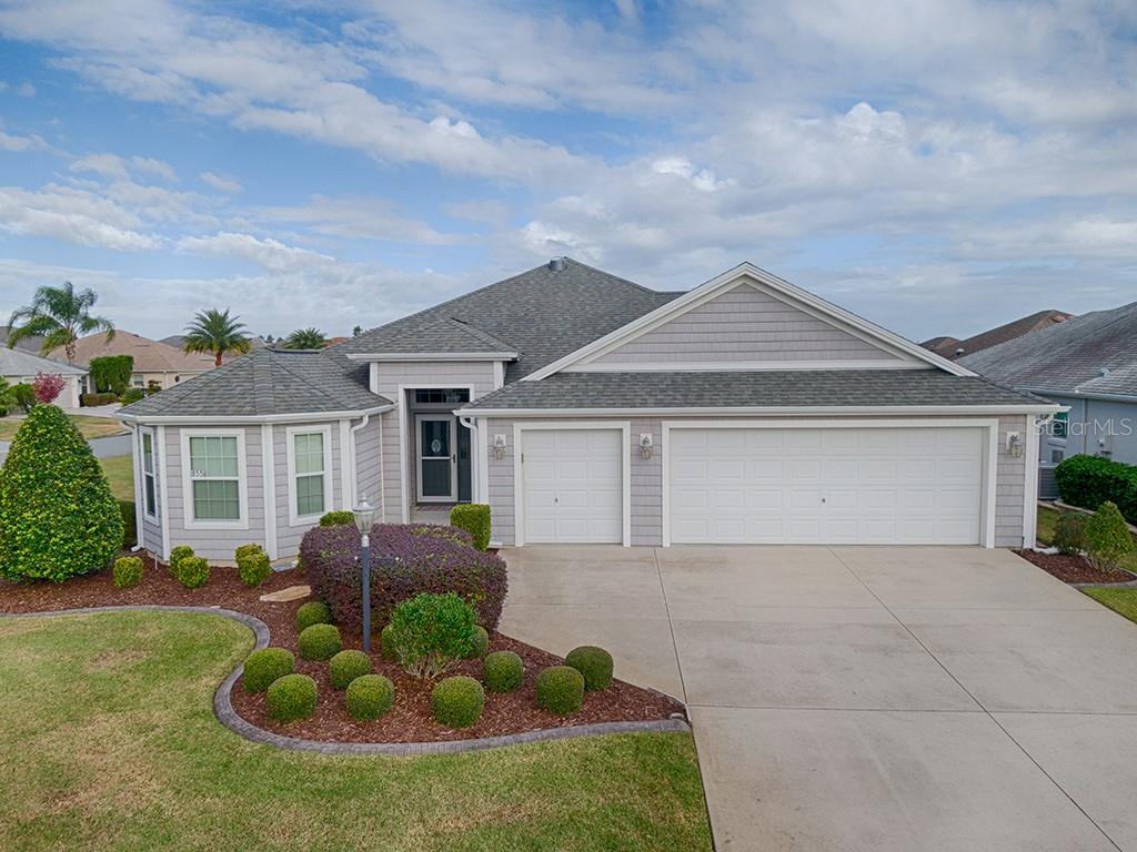 front view of house with a yard