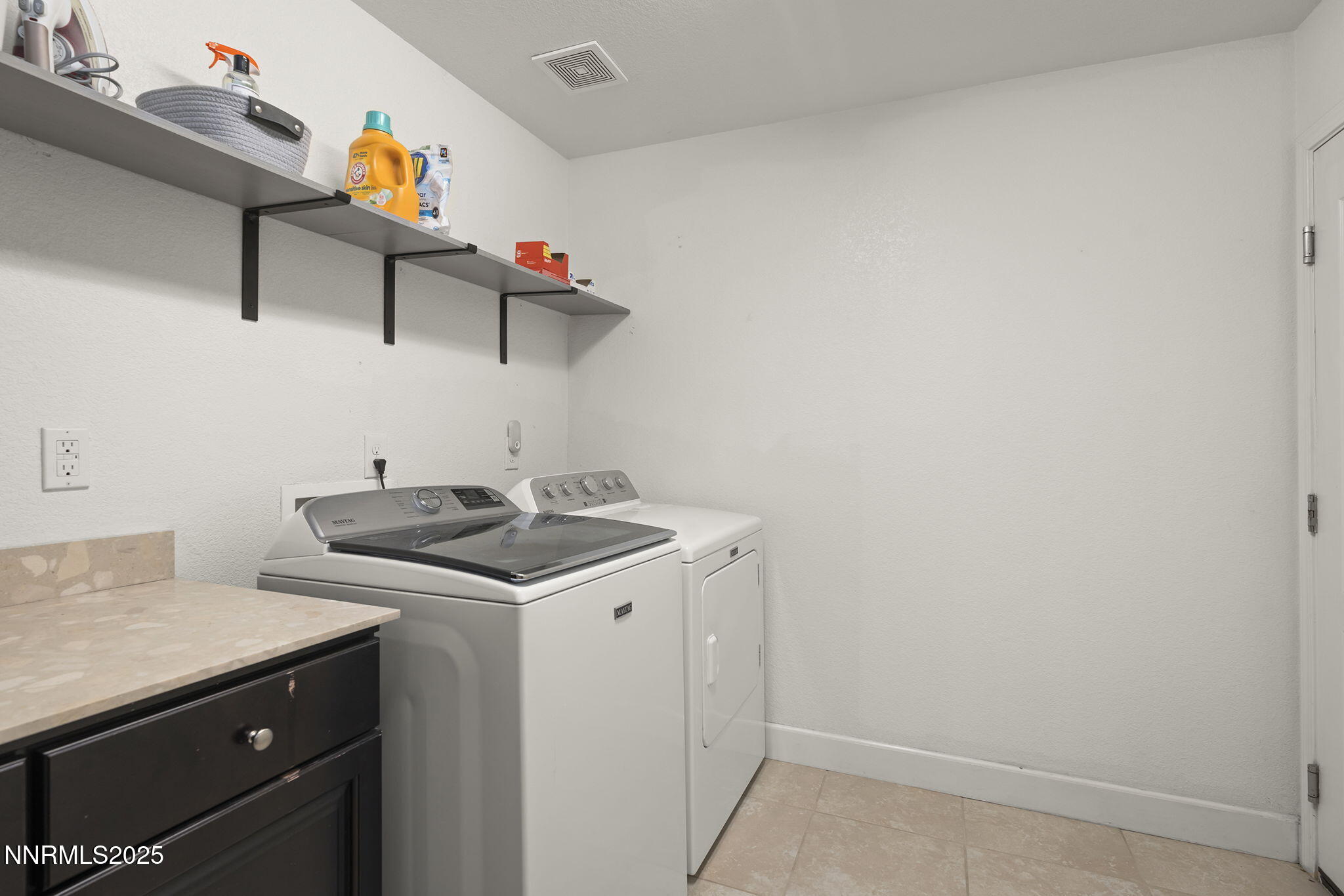 7707 Rhythm Circle Sparks, NV 89436 - Photo 19 of 30 a utility room with dryer and washer
