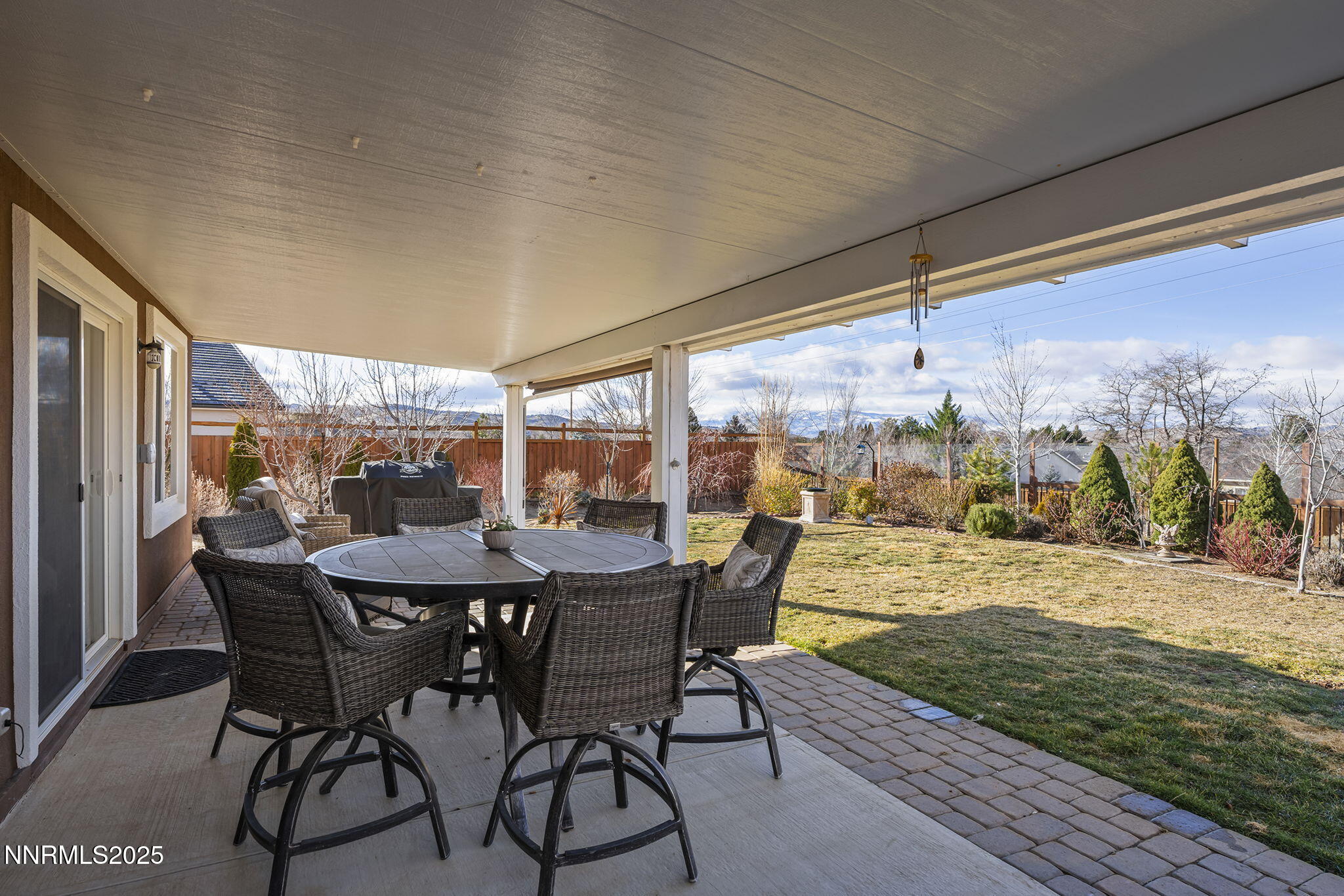 7707 Rhythm Circle Sparks, NV 89436 - Photo 21 of 30 a view of a patio with a table chairs and a table