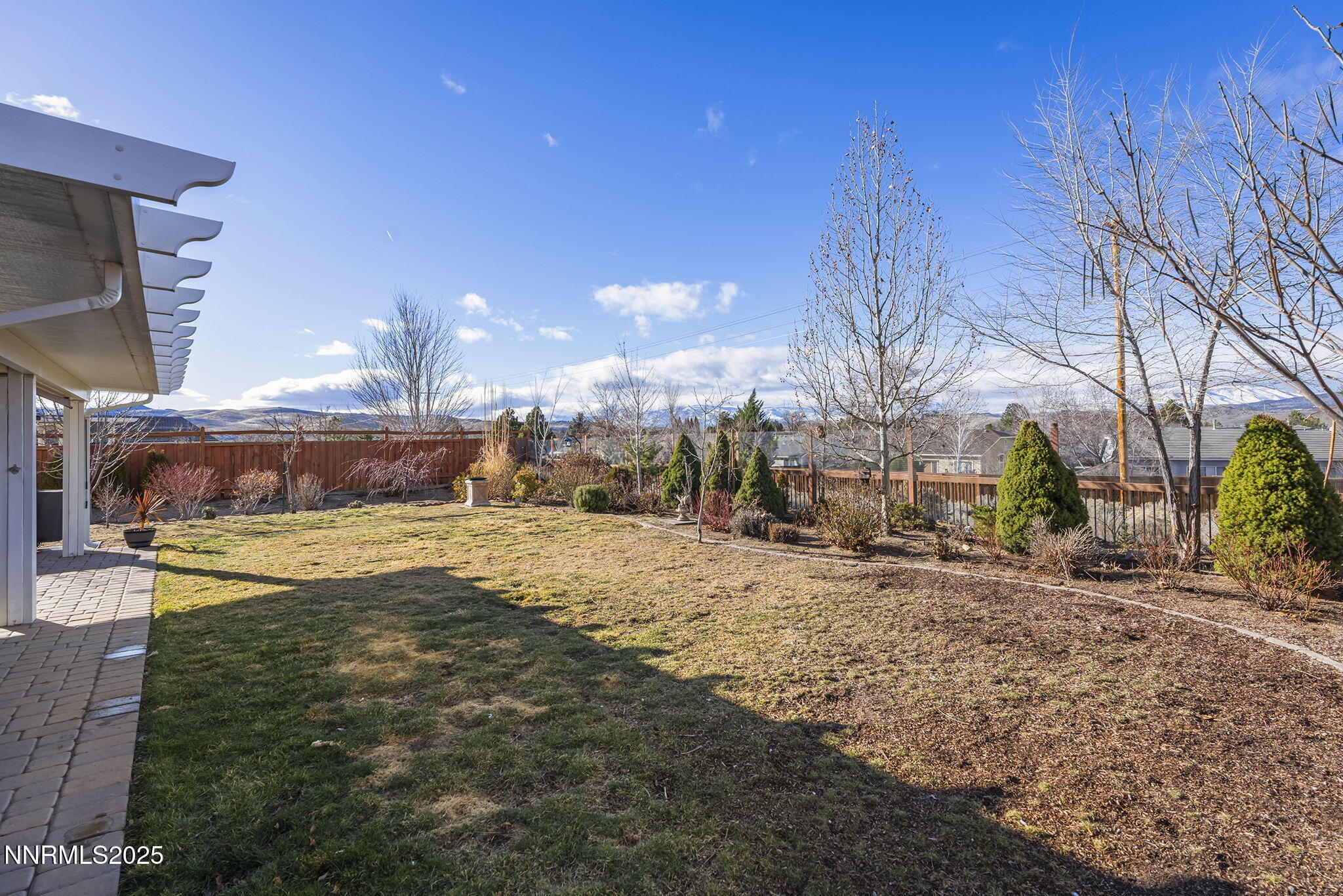 7707 Rhythm Circle Sparks, NV 89436 - Photo 23 of 30 a view of a house with a yard