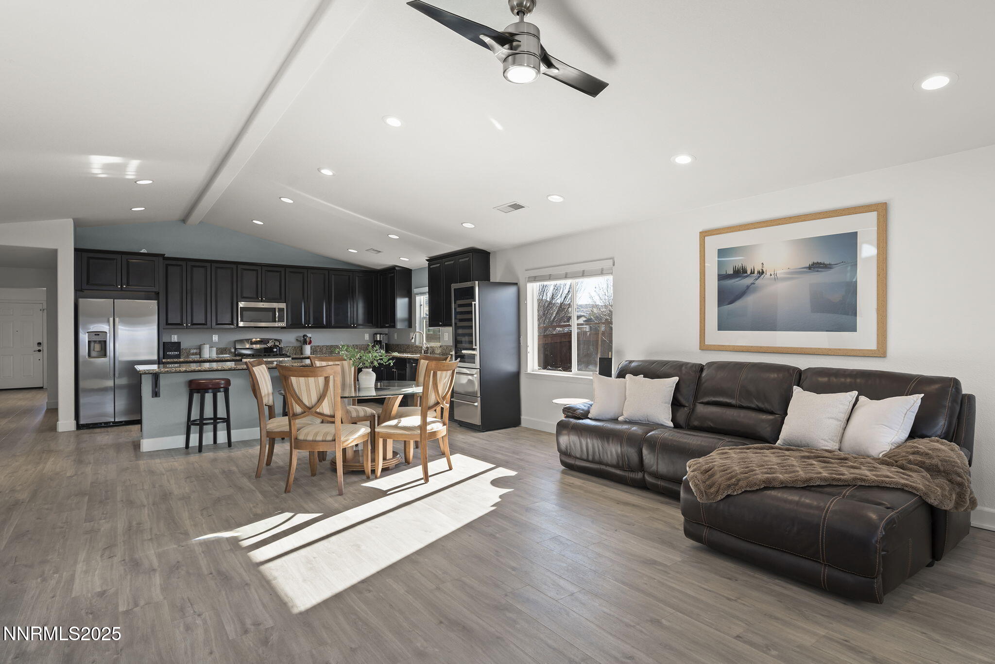 7707 Rhythm Circle Sparks, NV 89436 - Photo 4 of 30 a living room with furniture and kitchen view