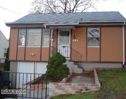 a front view of house with yard