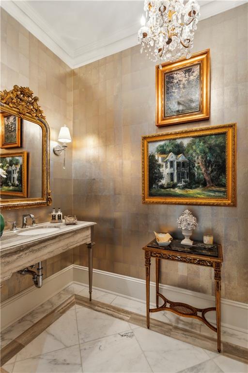 2440 Peachtree Road Northwest, Unit 6 Atlanta, GA 30305 - Photo 22 of 34 a bathroom with a mirror and a painting on the wall