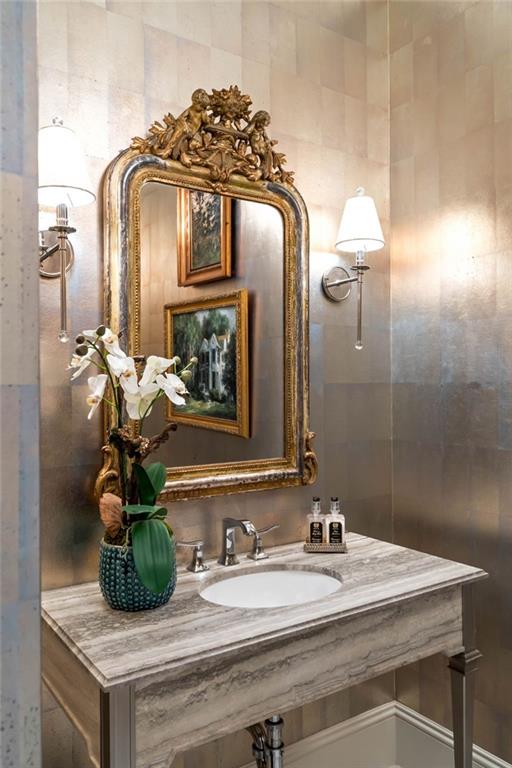 2440 Peachtree Road Northwest, Unit 6 Atlanta, GA 30305 - Photo 26 of 34 a bathroom with a sink and a mirror