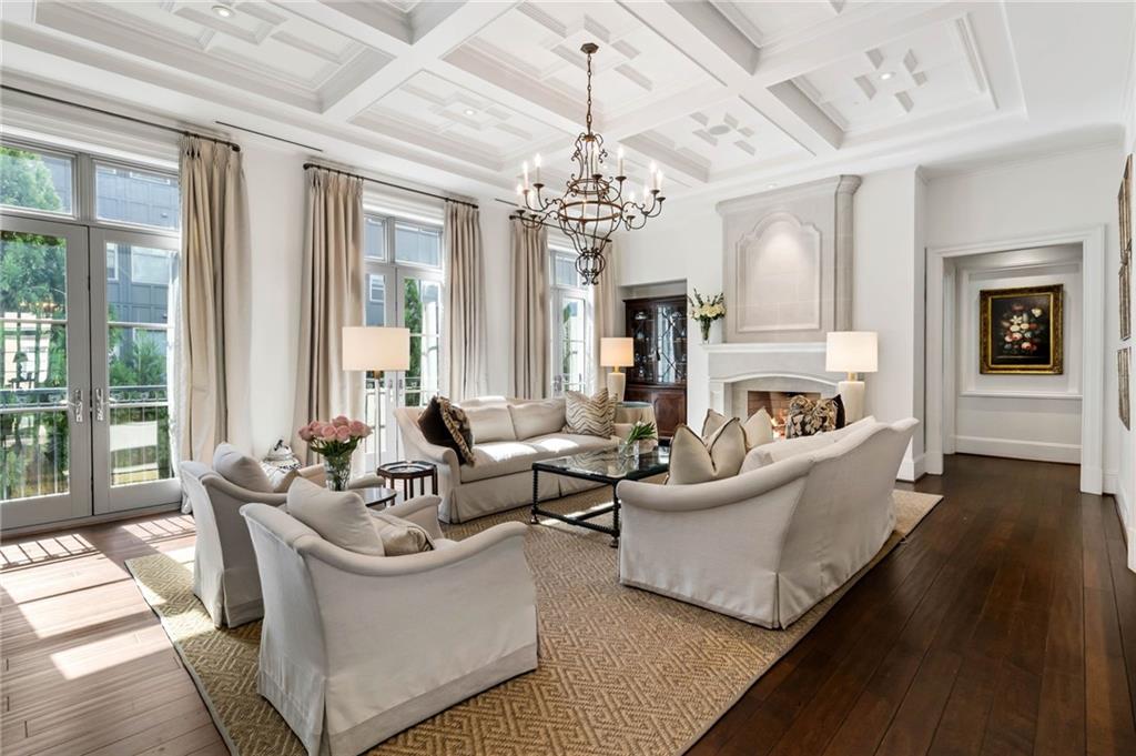 2440 Peachtree Road Northwest, Unit 6 Atlanta, GA 30305 - Photo 4 of 34 a living room with furniture and a large window