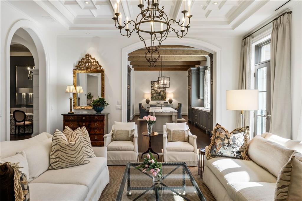 2440 Peachtree Road Northwest, Unit 6 Atlanta, GA 30305 - Photo 6 of 34 a living room with furniture a chandelier and a chandelier