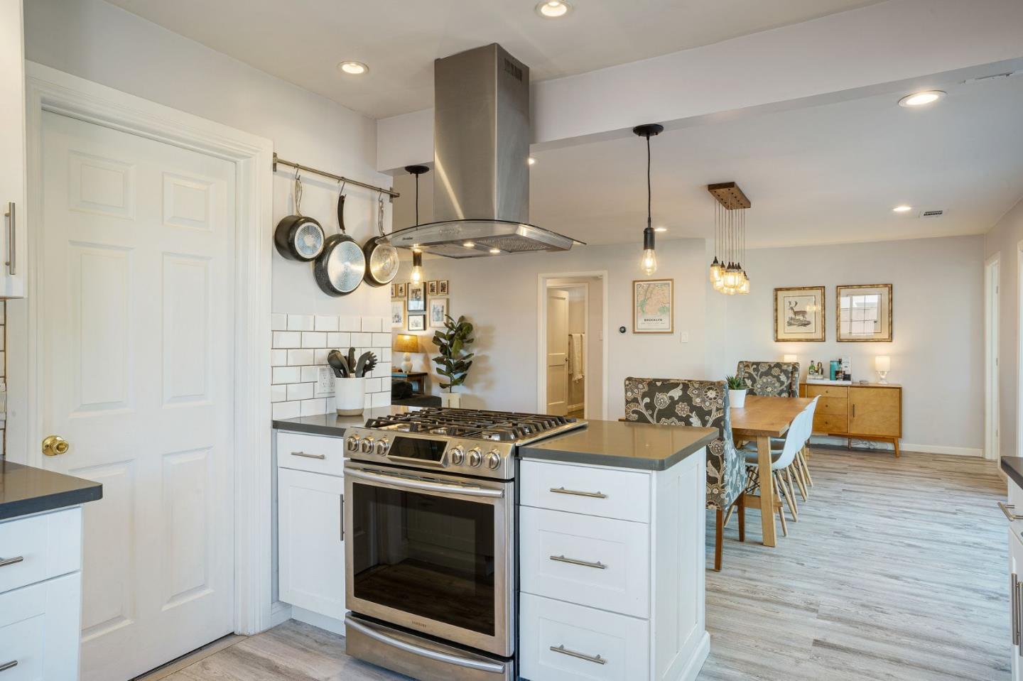 1851 Nash Drive San Mateo, CA 94401 - Photo 11 of 46 a kitchen with stainless steel appliances granite countertop a stove a sink and a refrigerator