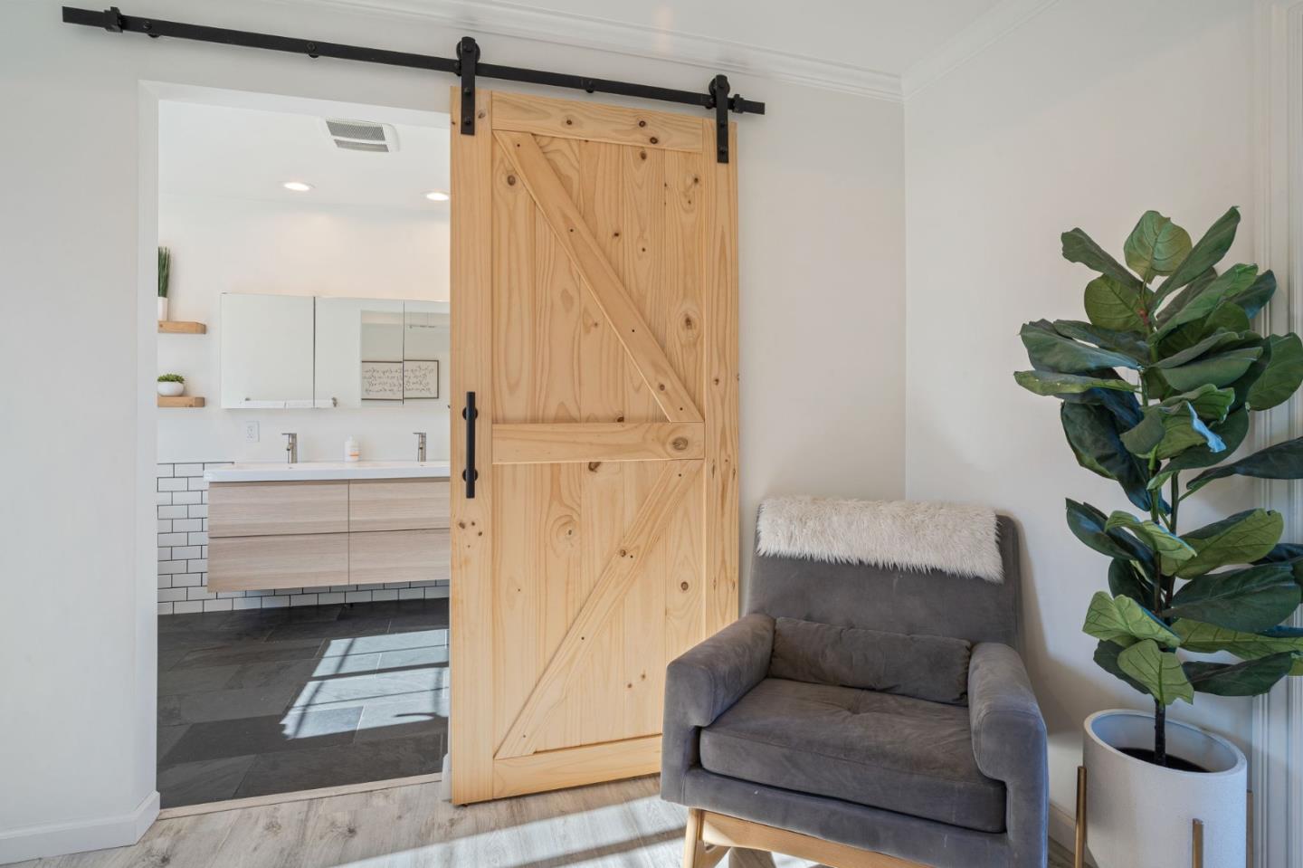 1851 Nash Drive San Mateo, CA 94401 - Photo 15 of 46 a living room with furniture and a potted plant