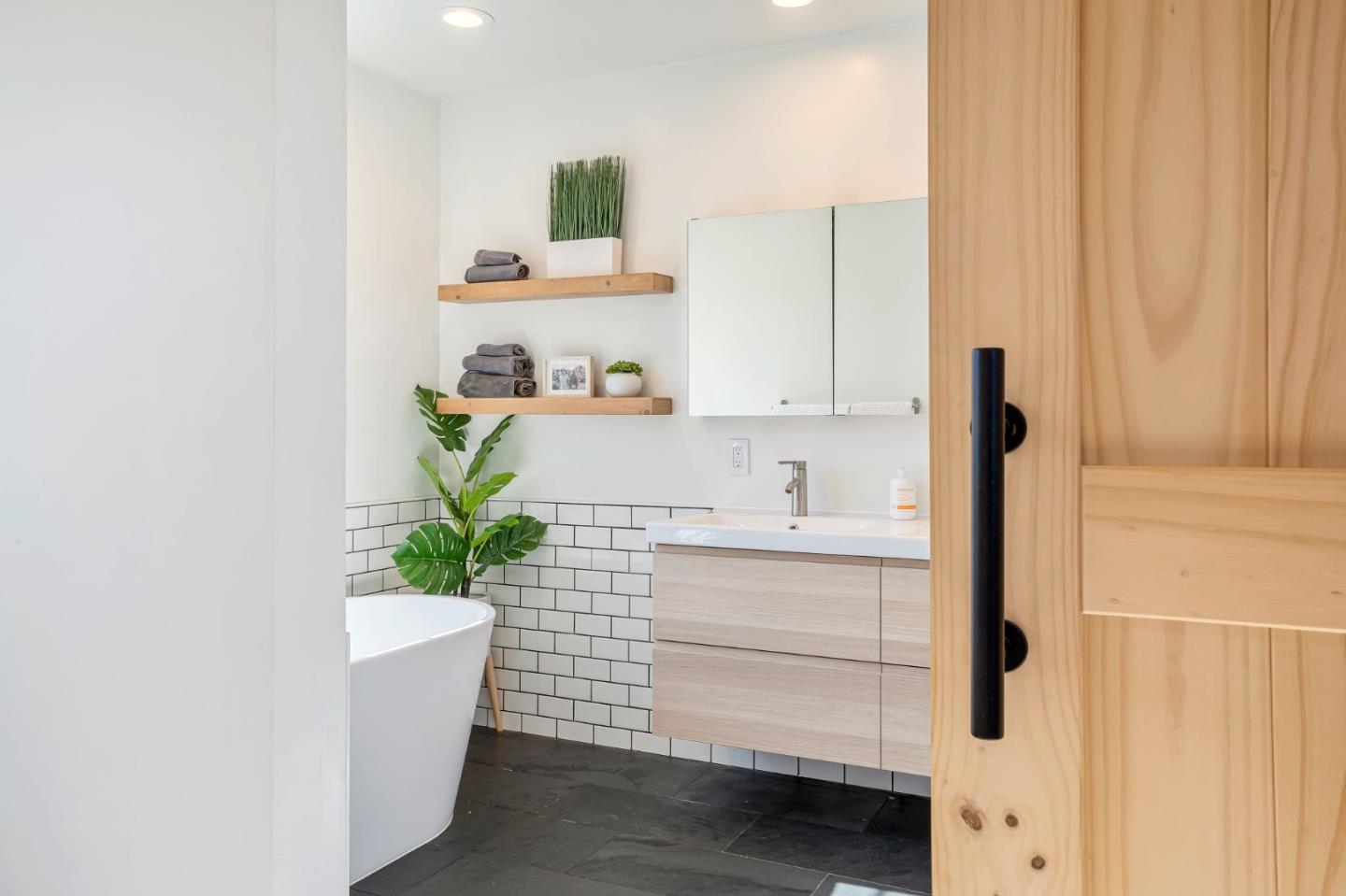 1851 Nash Drive San Mateo, CA 94401 - Photo 16 of 46 a kitchen with a white cabinet and a sink
