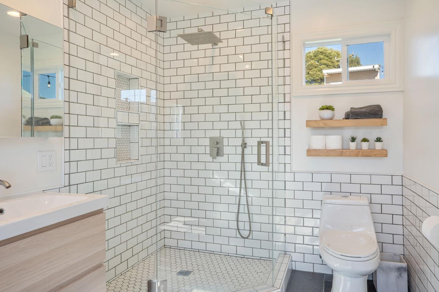 1851 Nash Drive San Mateo, CA 94401 - Photo 20 of 46 a bathroom with a toilet and a shower