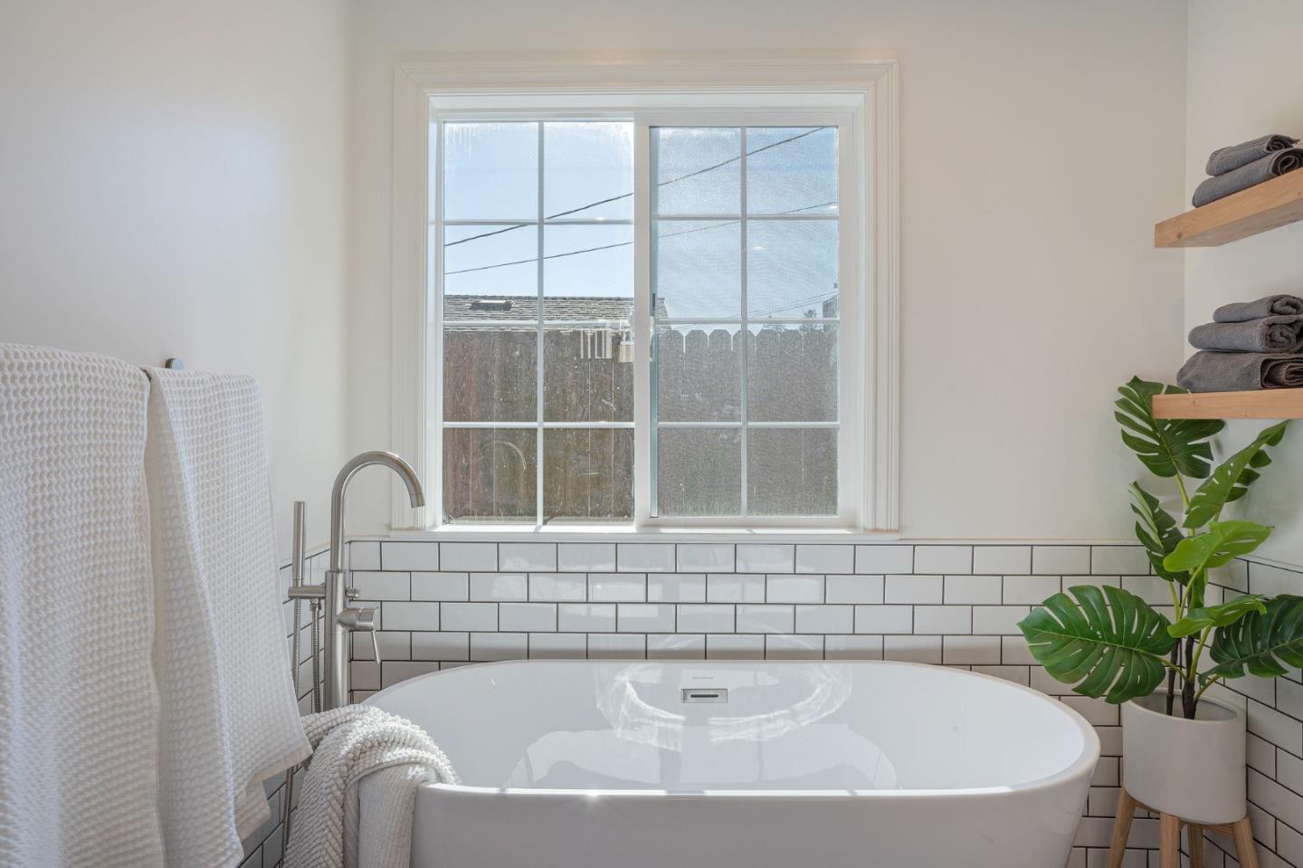 1851 Nash Drive San Mateo, CA 94401 - Photo 22 of 46 a bathroom with a tub