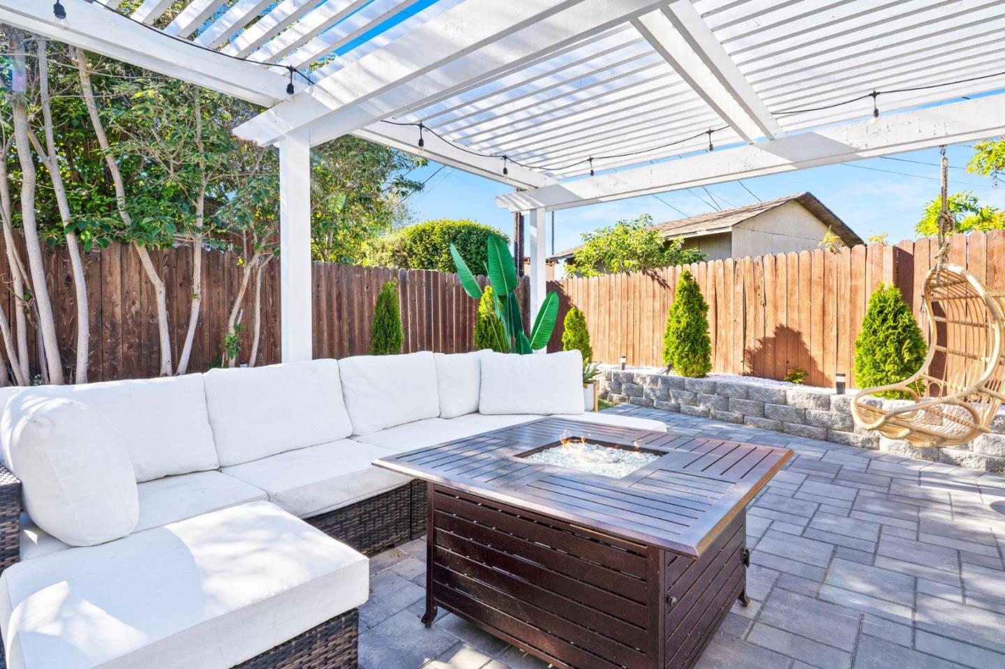 1851 Nash Drive San Mateo, CA 94401 - Photo 32 of 46 a living room with patio furniture and a potted plant
