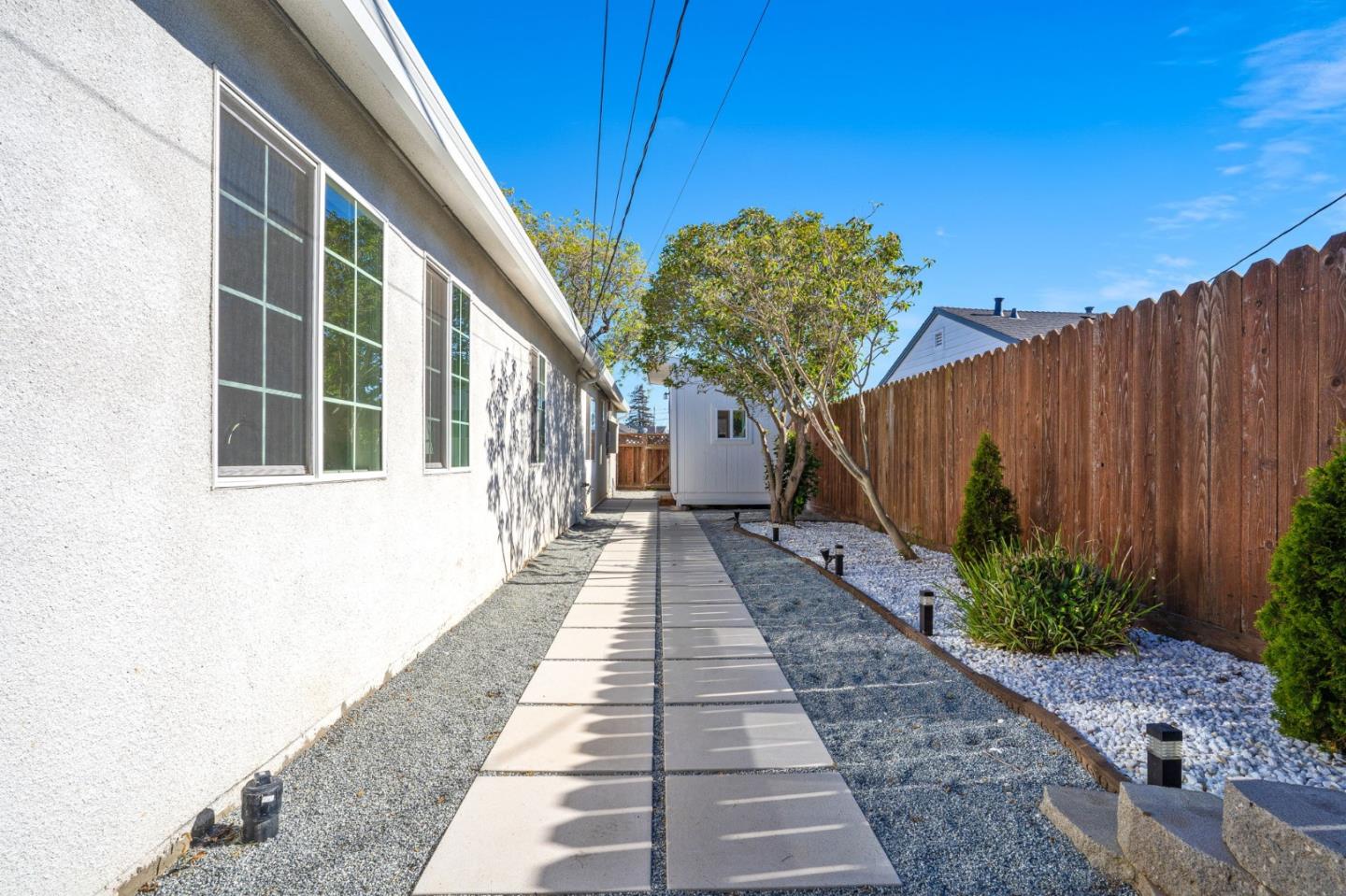 1851 Nash Drive San Mateo, CA 94401 - Photo 37 of 46 a view of a pathway with a house