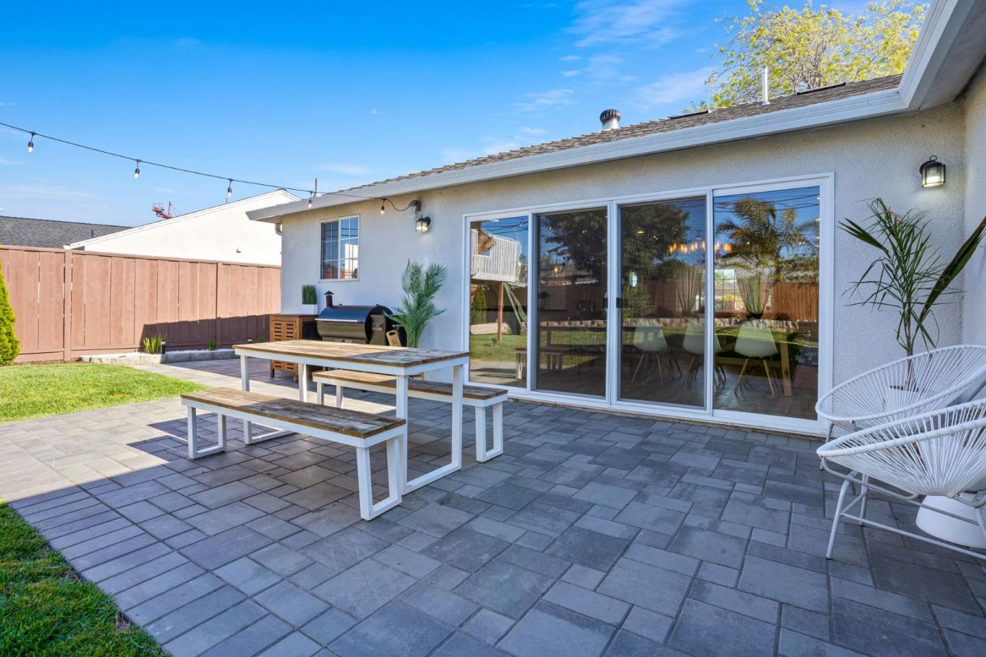 1851 Nash Drive San Mateo, CA 94401 - Photo 40 of 46 a house view with a sitting space and garden