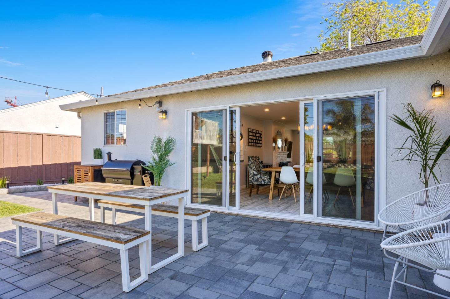 1851 Nash Drive San Mateo, CA 94401 - Photo 41 of 46 a view of a dinning table and chairs in patio of the house