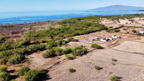 a view of a city with mountains in the background