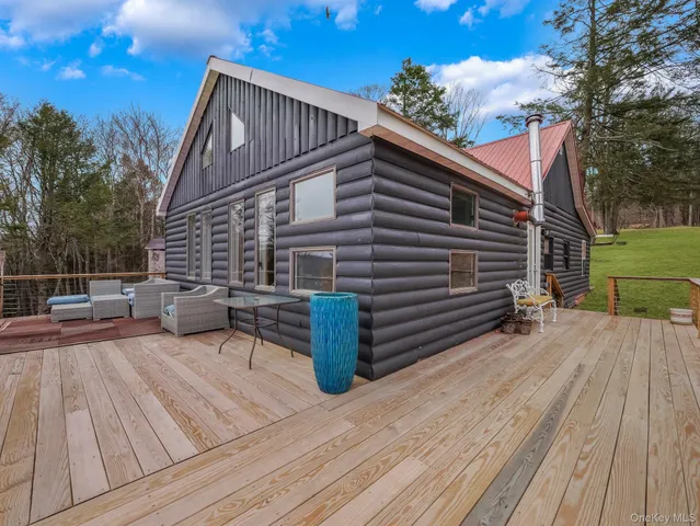 a view of a backyard of a house