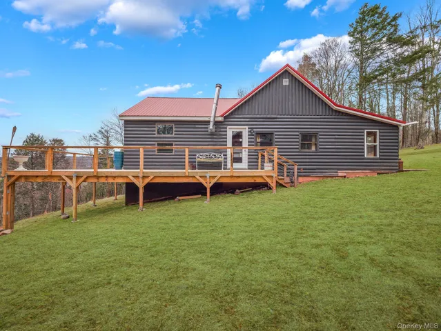 a view of a house with a big yard