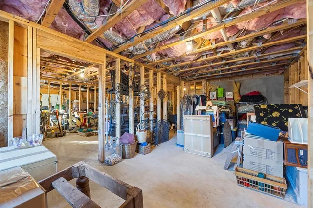 a view of a very nice looking room with many windows