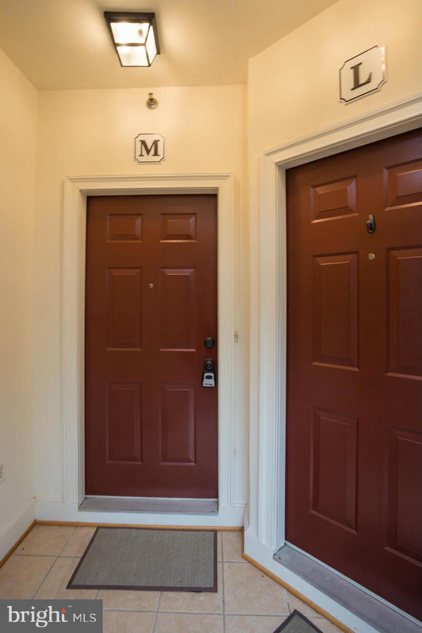 5723 Callcott Way, Unit M Alexandria, VA 22312 - Photo 3 of 28 a view of door