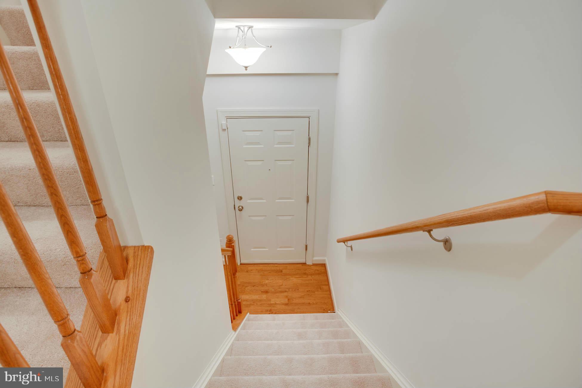 5723 Callcott Way, Unit M Alexandria, VA 22312 - Photo 4 of 28 a bathroom with a shower and a tub