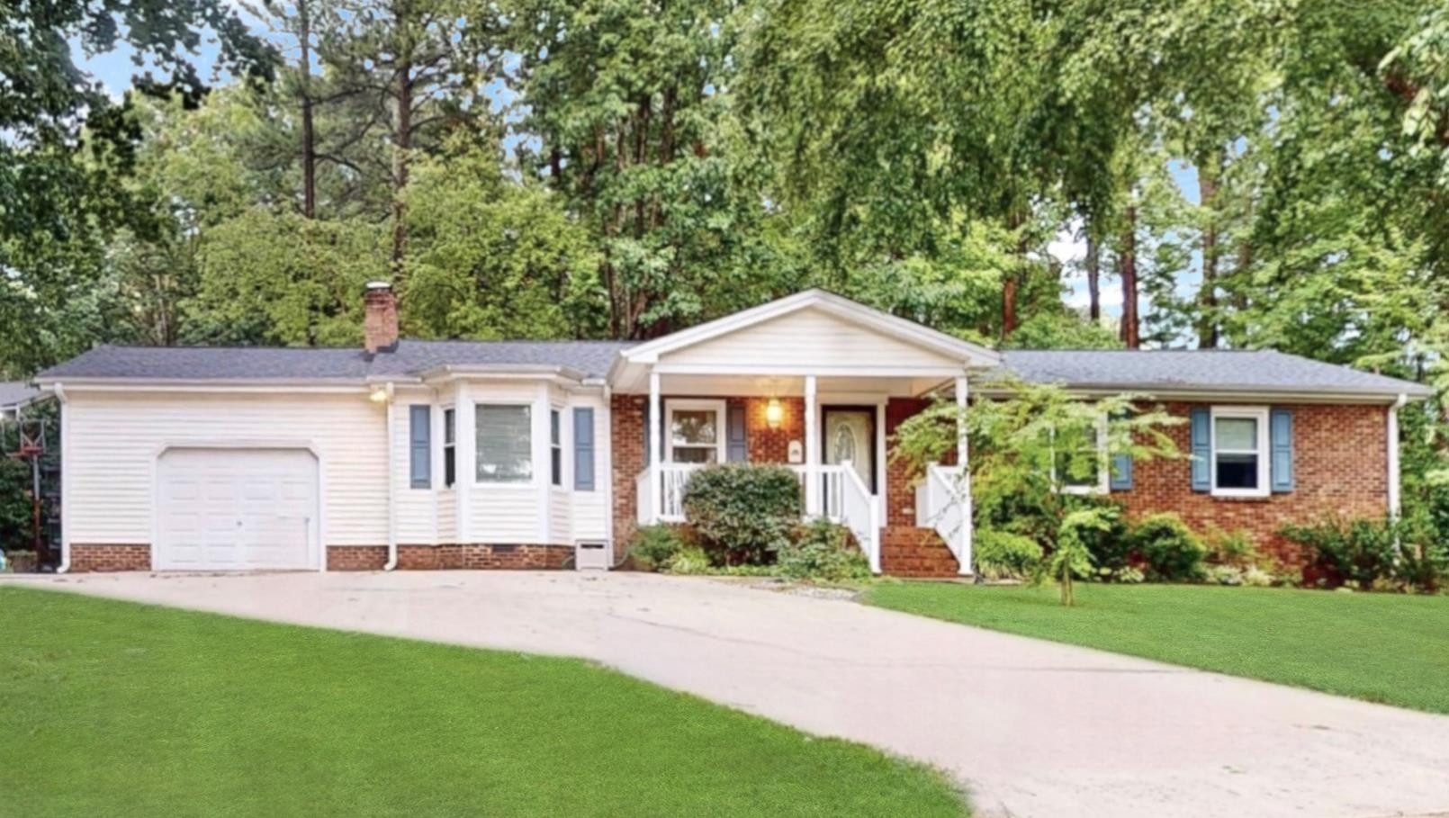 826 Chip Circle Cary, NC 27513 - Photo 1 of 44 front view of a house with a yard