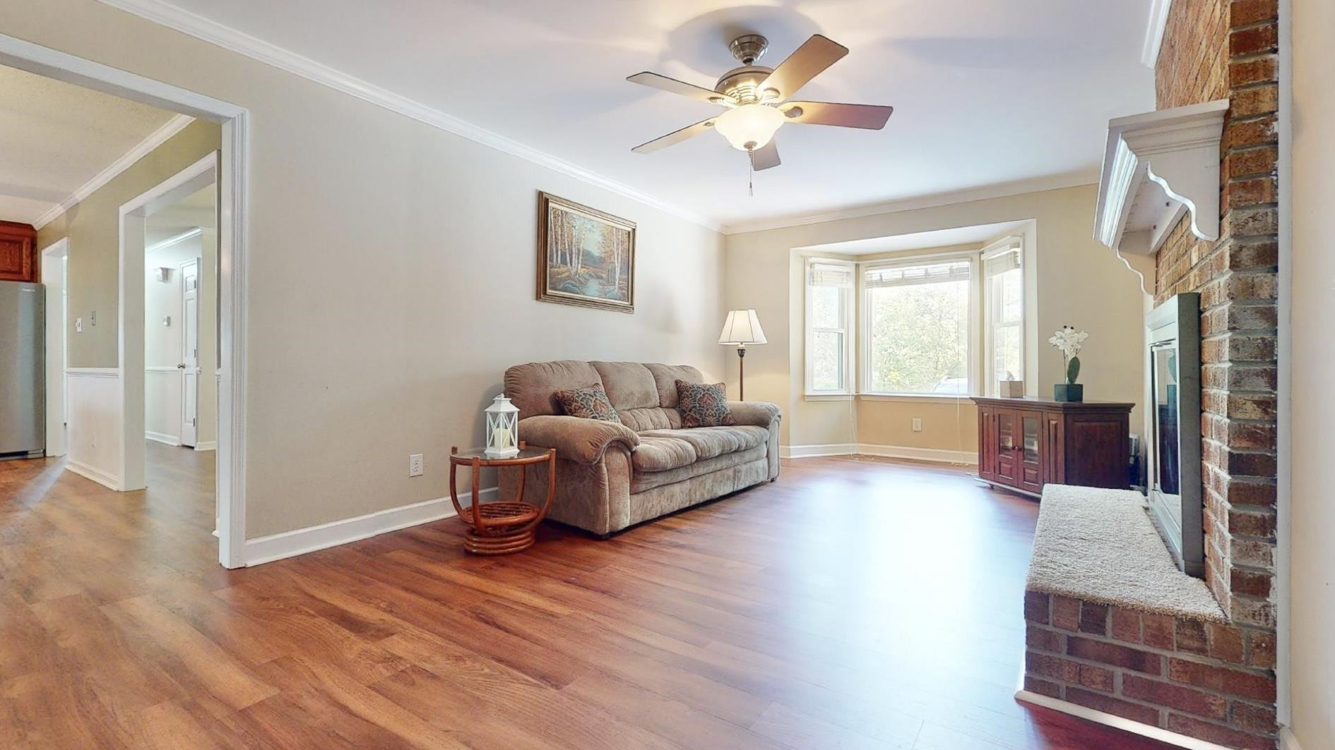 826 Chip Circle Cary, NC 27513 - Photo 17 of 44 a living room with furniture and a wooden floor