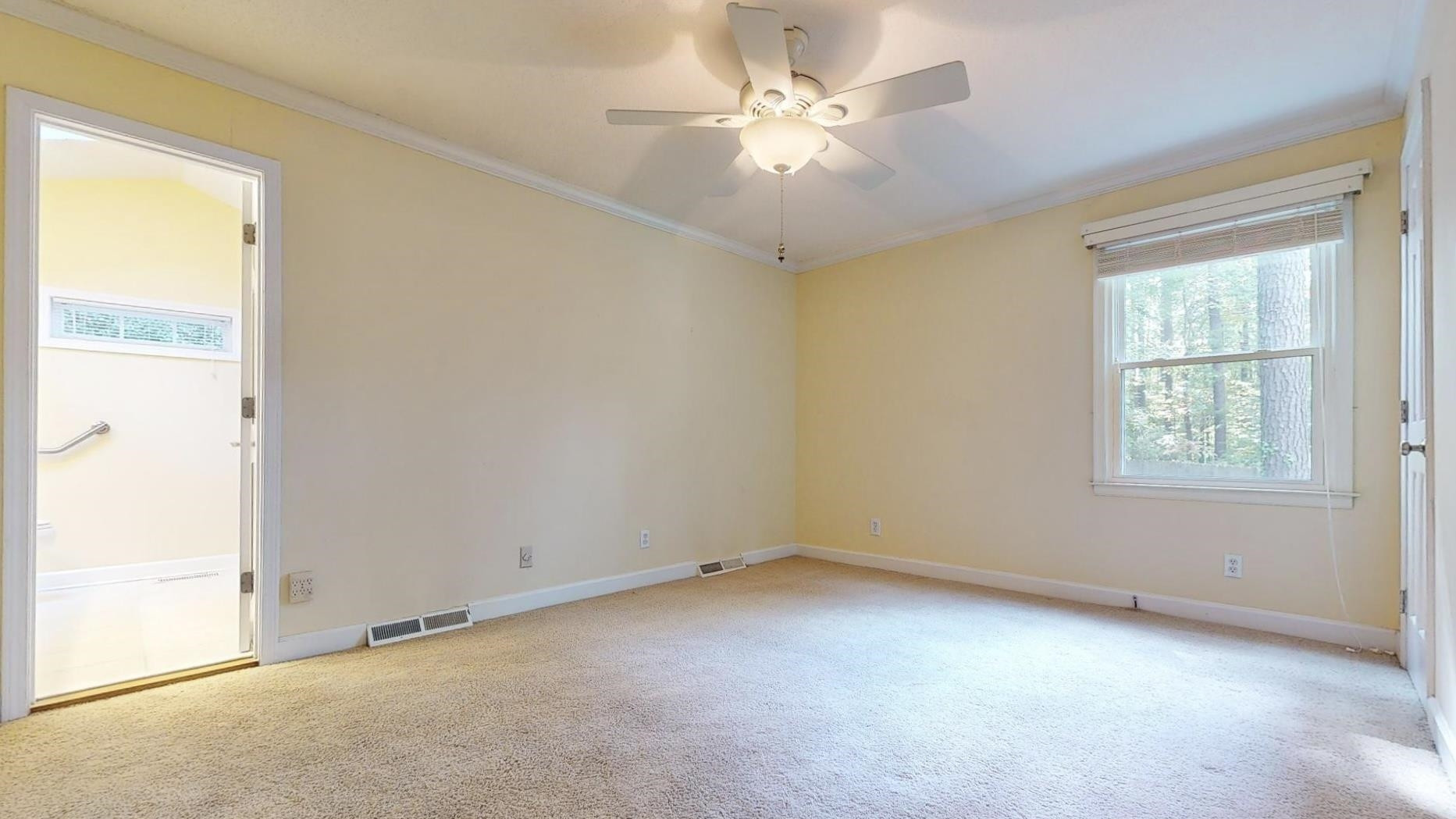 826 Chip Circle Cary, NC 27513 - Photo 20 of 44 an empty room with a window