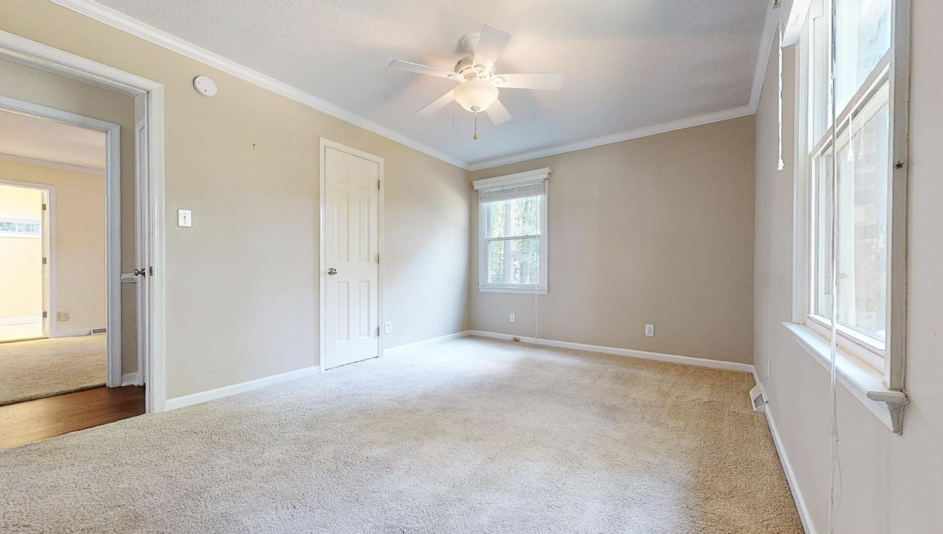 826 Chip Circle Cary, NC 27513 - Photo 25 of 44 a view of an empty room with a window