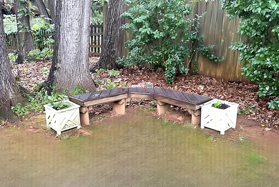 826 Chip Circle Cary, NC 27513 - Photo 41 of 44 a swimming pool with some trees in the background
