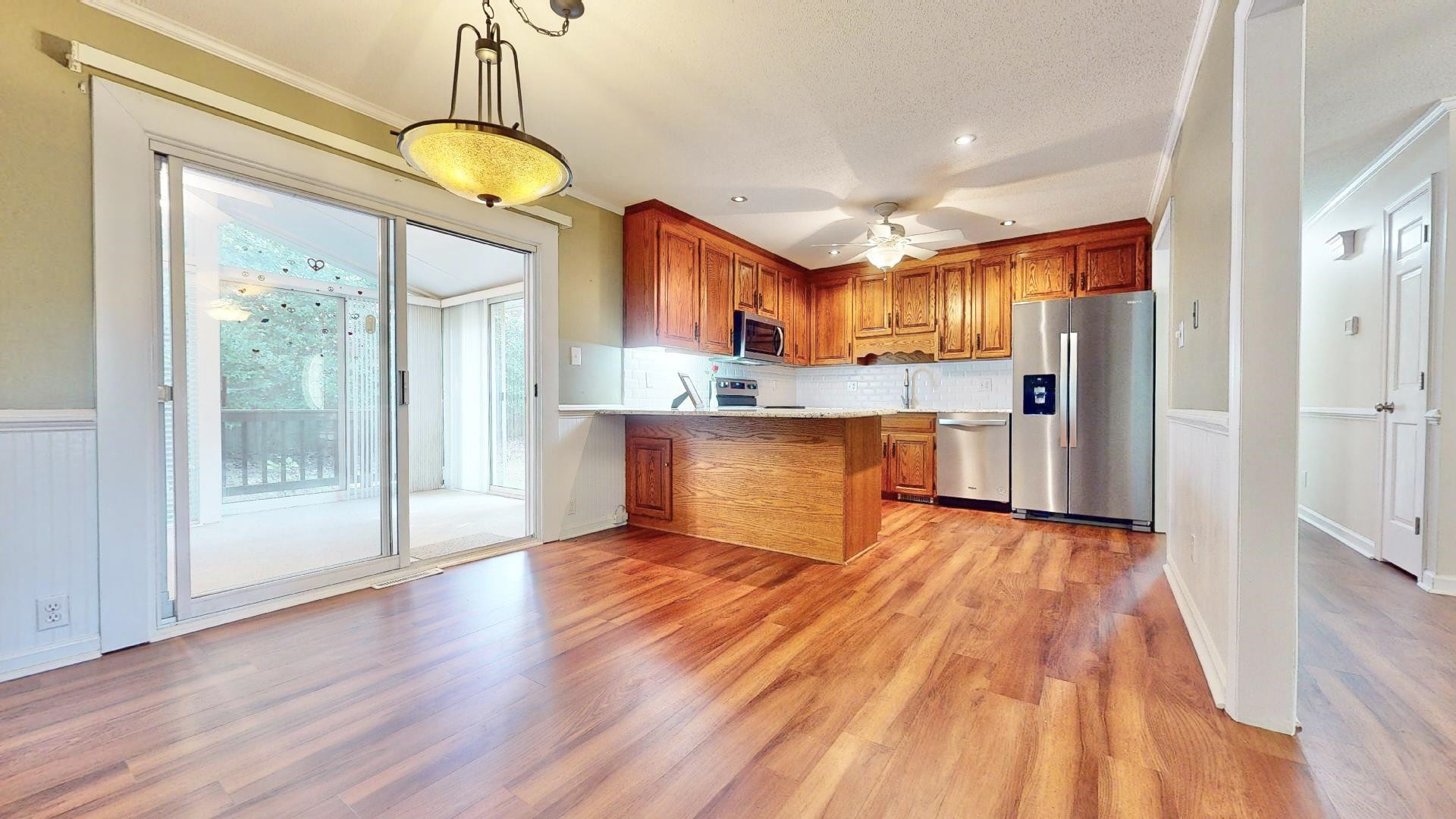 826 Chip Circle Cary, NC 27513 - Photo 10 of 44 a view of kitchen with wooden floor and electronic appliances