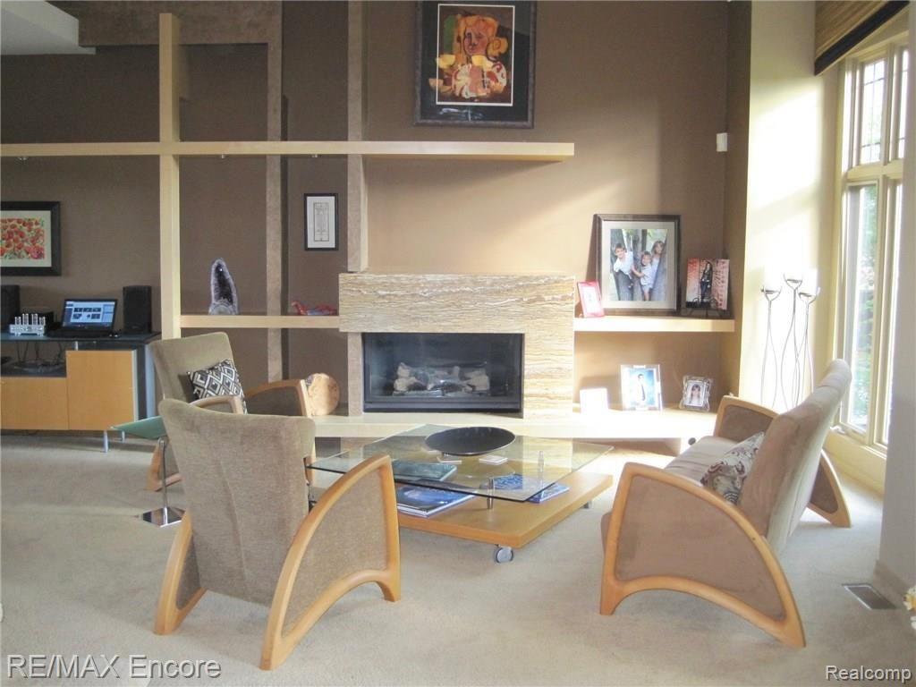 6787 Oakhurst Ridge Road Clarkston, MI 48348 - Photo 15 of 37 Living Room Limestone Fireplace