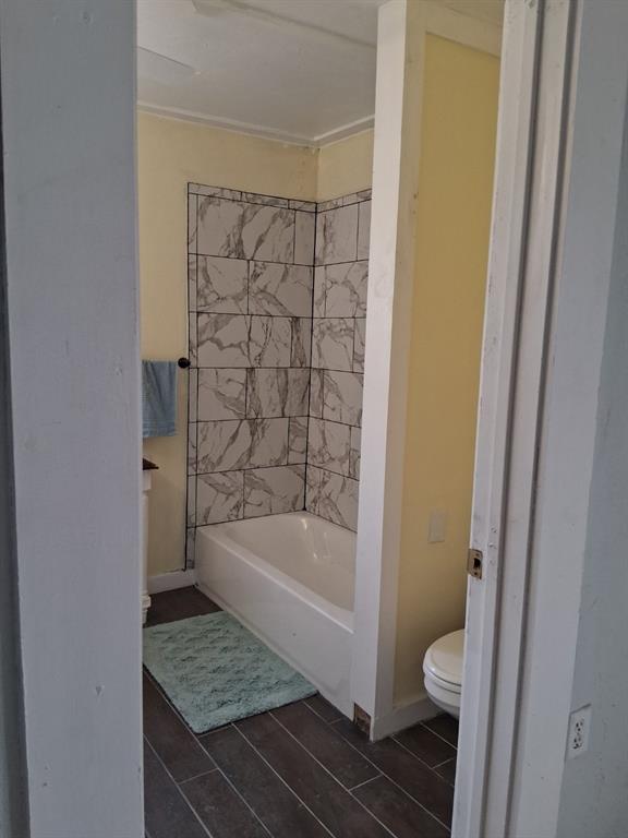 1584 Kelly Road, Unit A Aledo, TX 76008 - Photo 11 of 15 a bathroom with a granite countertop sink toilet and shower