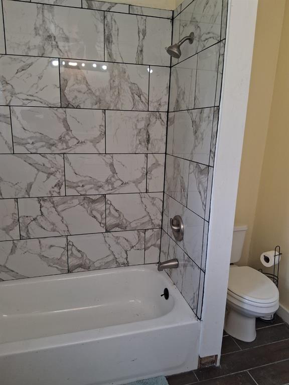 1584 Kelly Road, Unit A Aledo, TX 76008 - Photo 10 of 15 a bathroom with a bathtub and a toilet