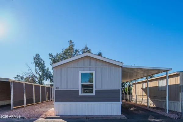 a front view of a house with garage