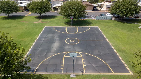 a view of swimming pool with a yard