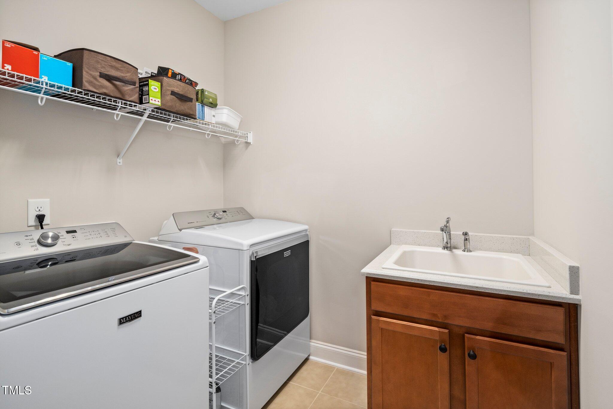 512 Fallon Grove Way Raleigh, NC 27608 - Photo 27 of 34 a utility room with dryer and washer